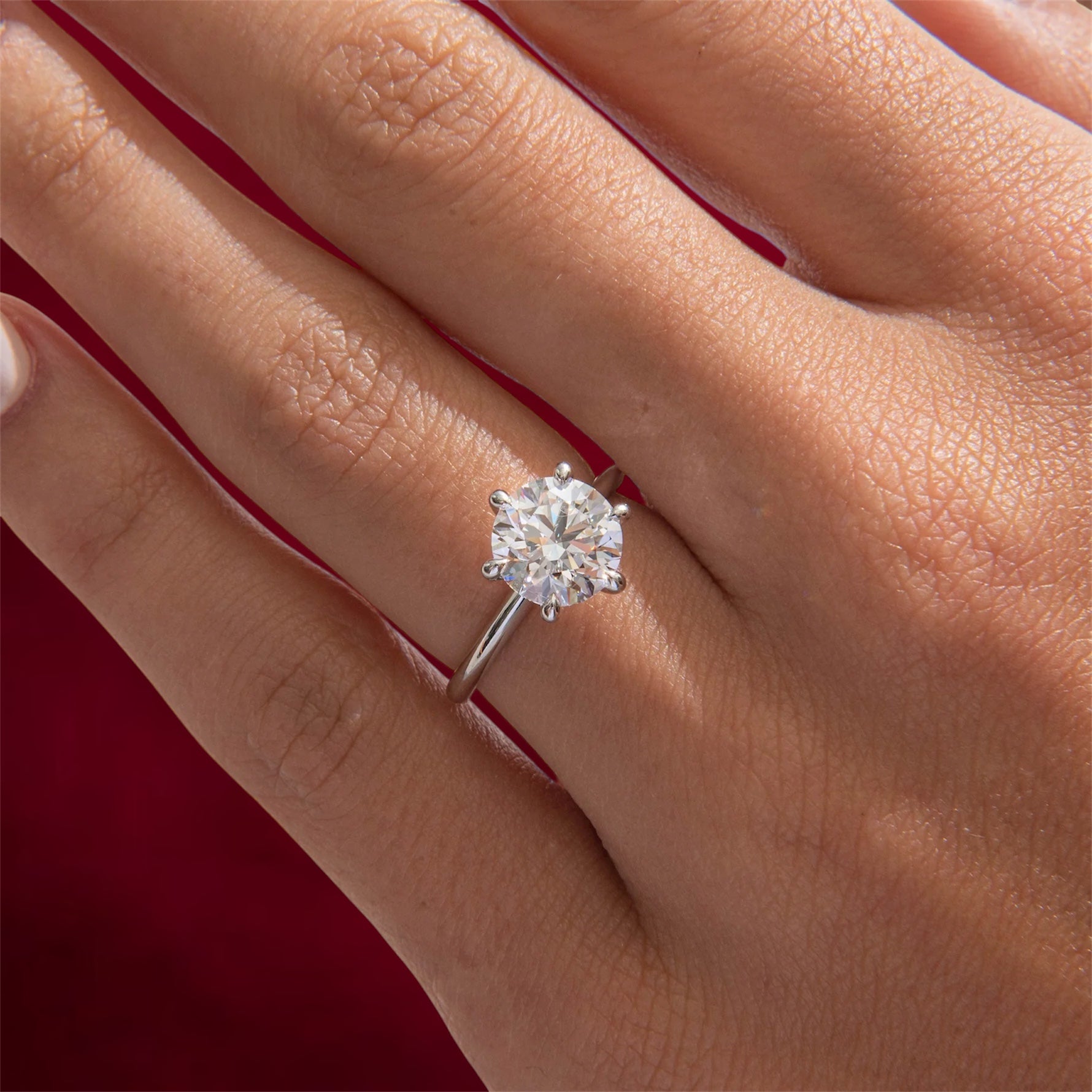 טבעת אירוסין יהלום עגול 1.5 קראט בשיבוץ טוליפ 6 שיניים