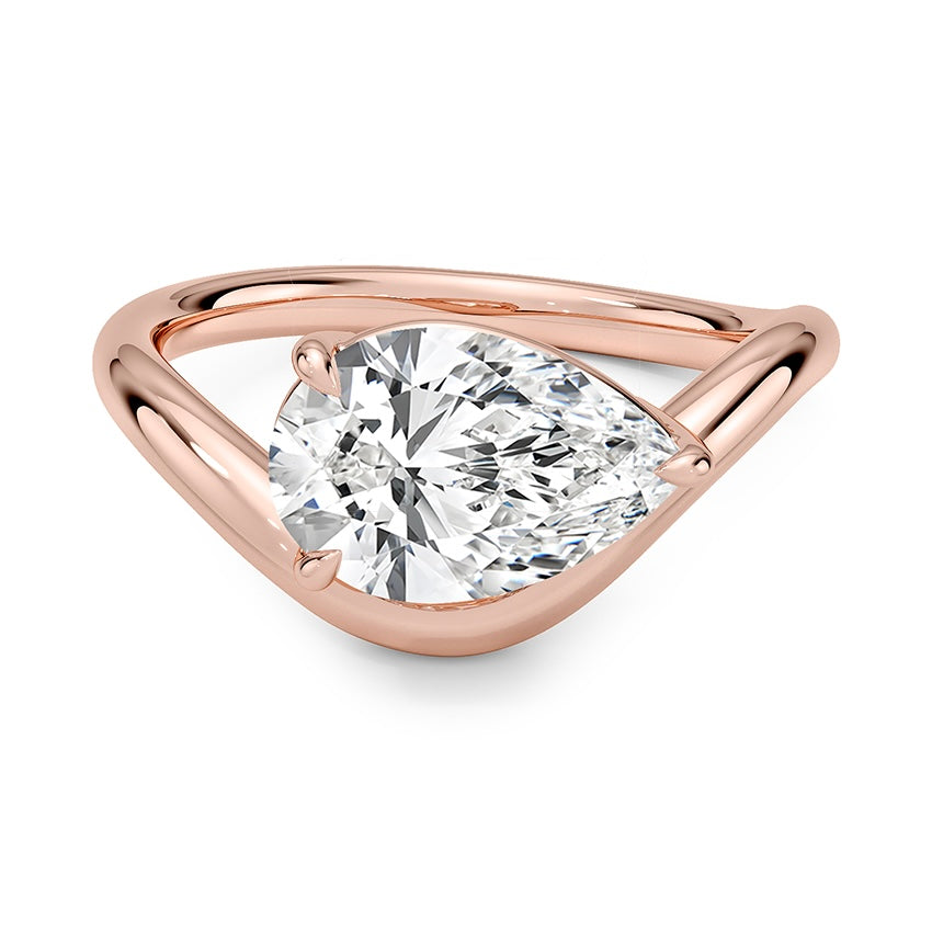 טבעת טוויסט יהלום טיפה 2 קראט בשיבוץ מזרח מערב