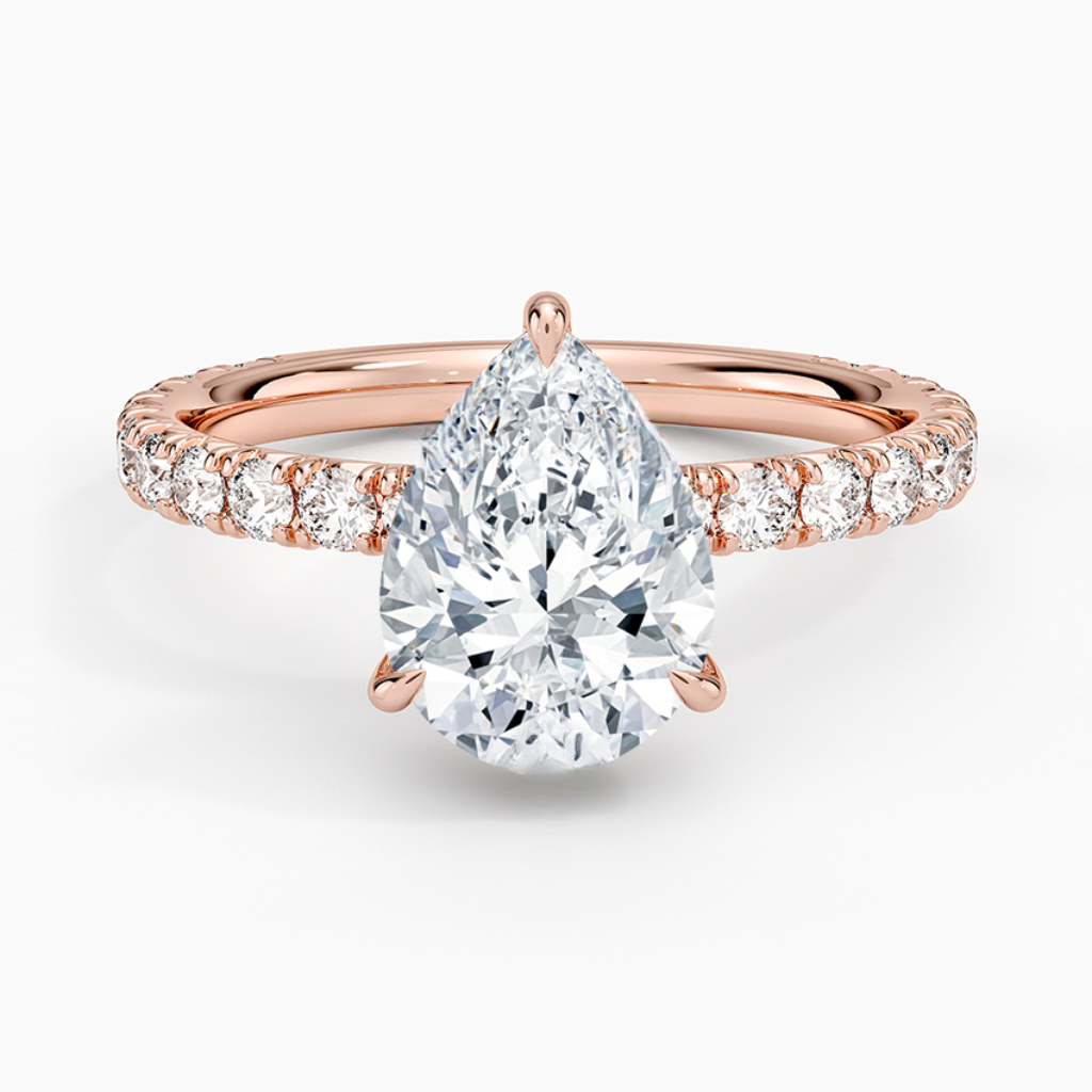 טבעת אירוסין יהלום טיפה 1.8 קראט עם יהלומי צד והילה נסתרת