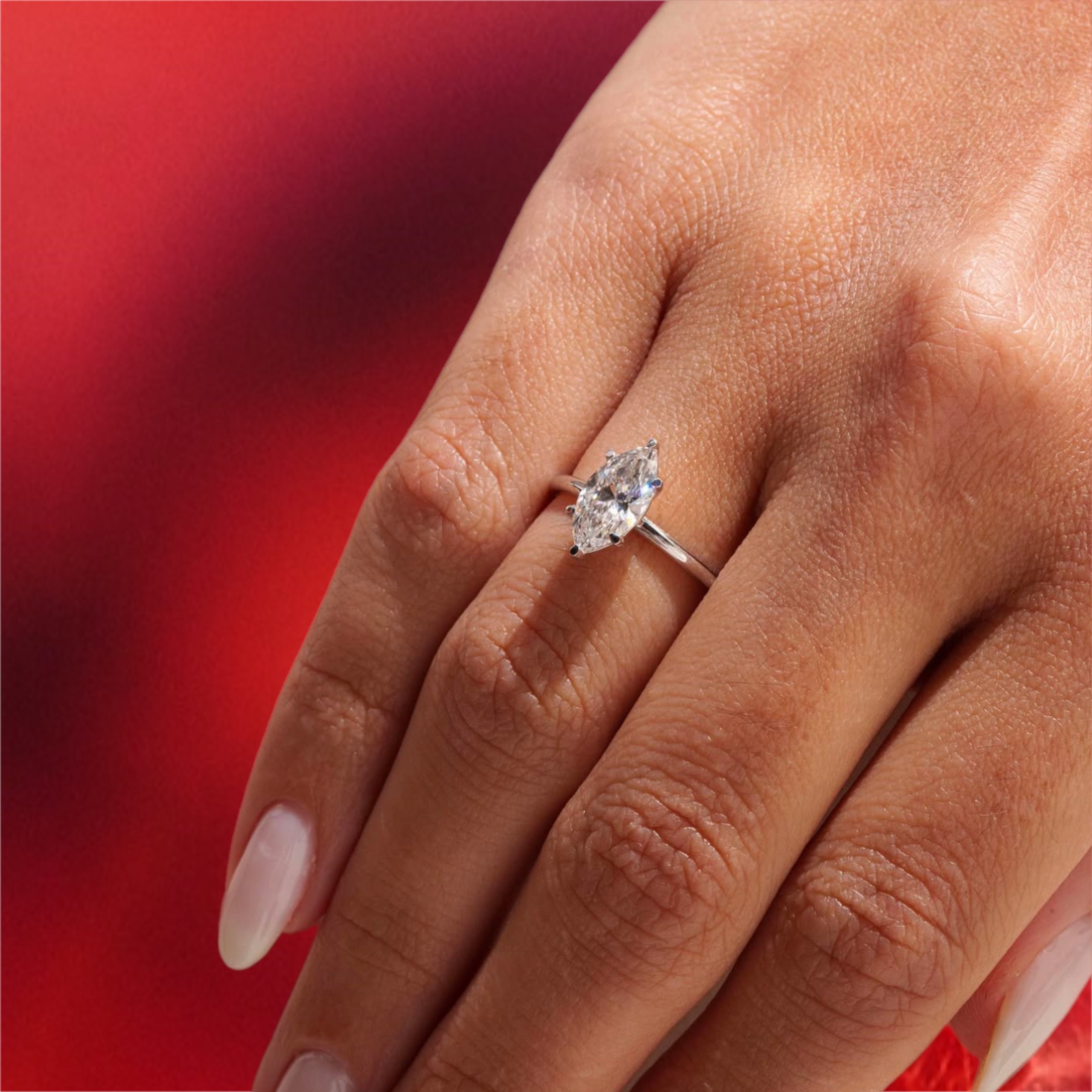 טבעת אירוסין יהלום מרקיזה 1.2 קראט בשיבוץ טוליפ 6 שיניים