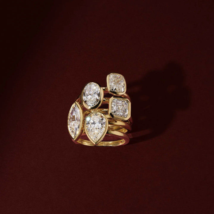 טבעת אירוסין סוליטר יהלום טיפה 1 קראט בשיבוץ בזל